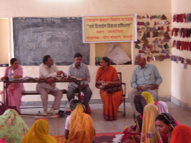General Field Work: presentingthe products made during womens self help group during lather cluster training programme