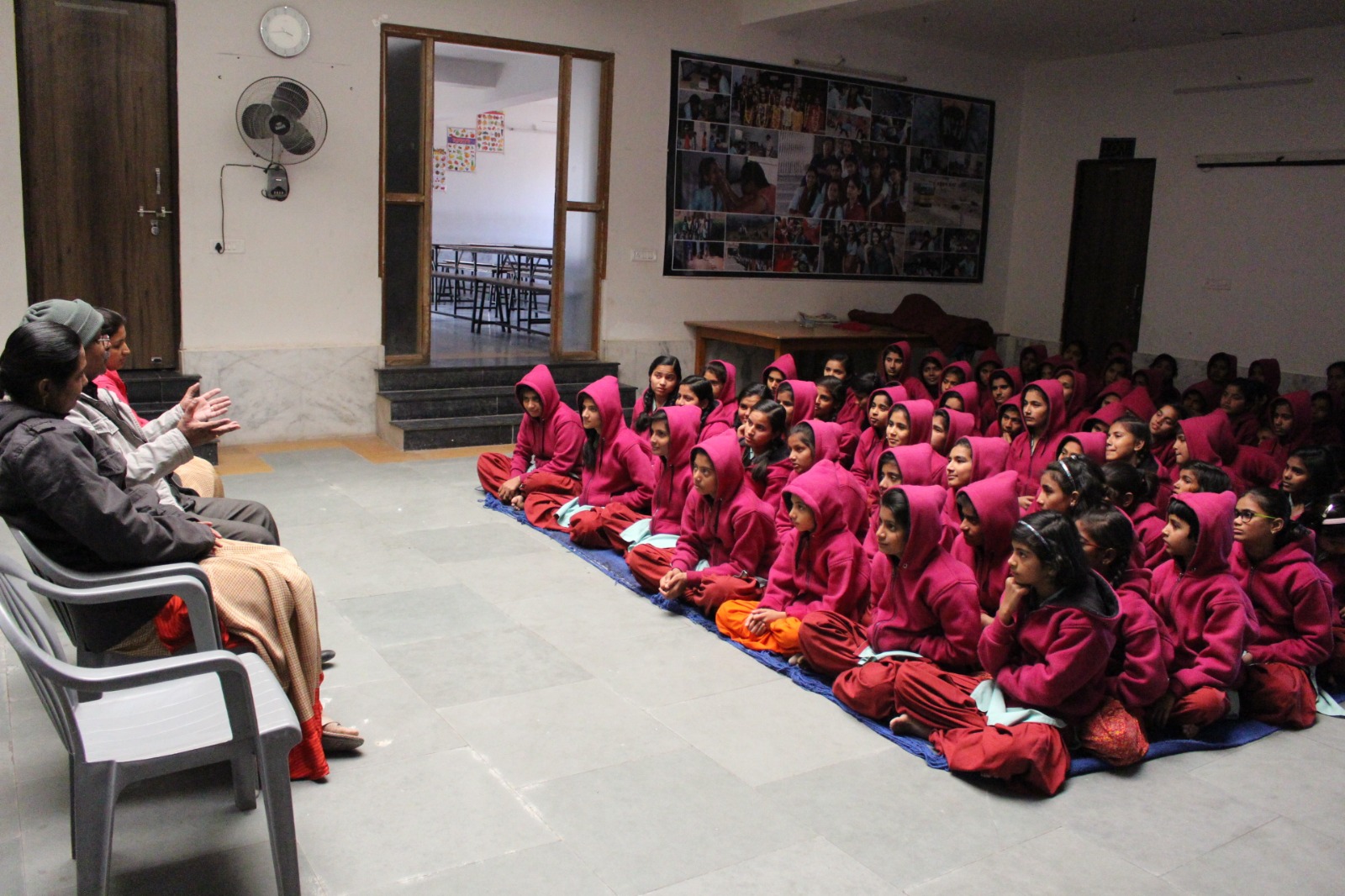 Girls seated together during a group session