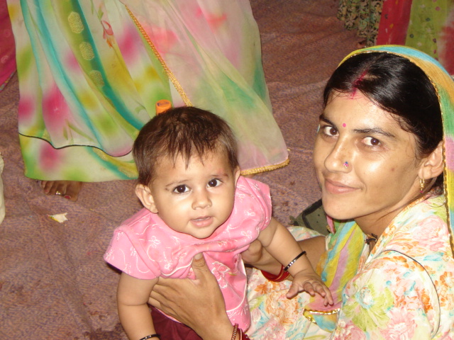 Child Nutrition & Health: smiling mother healthy child