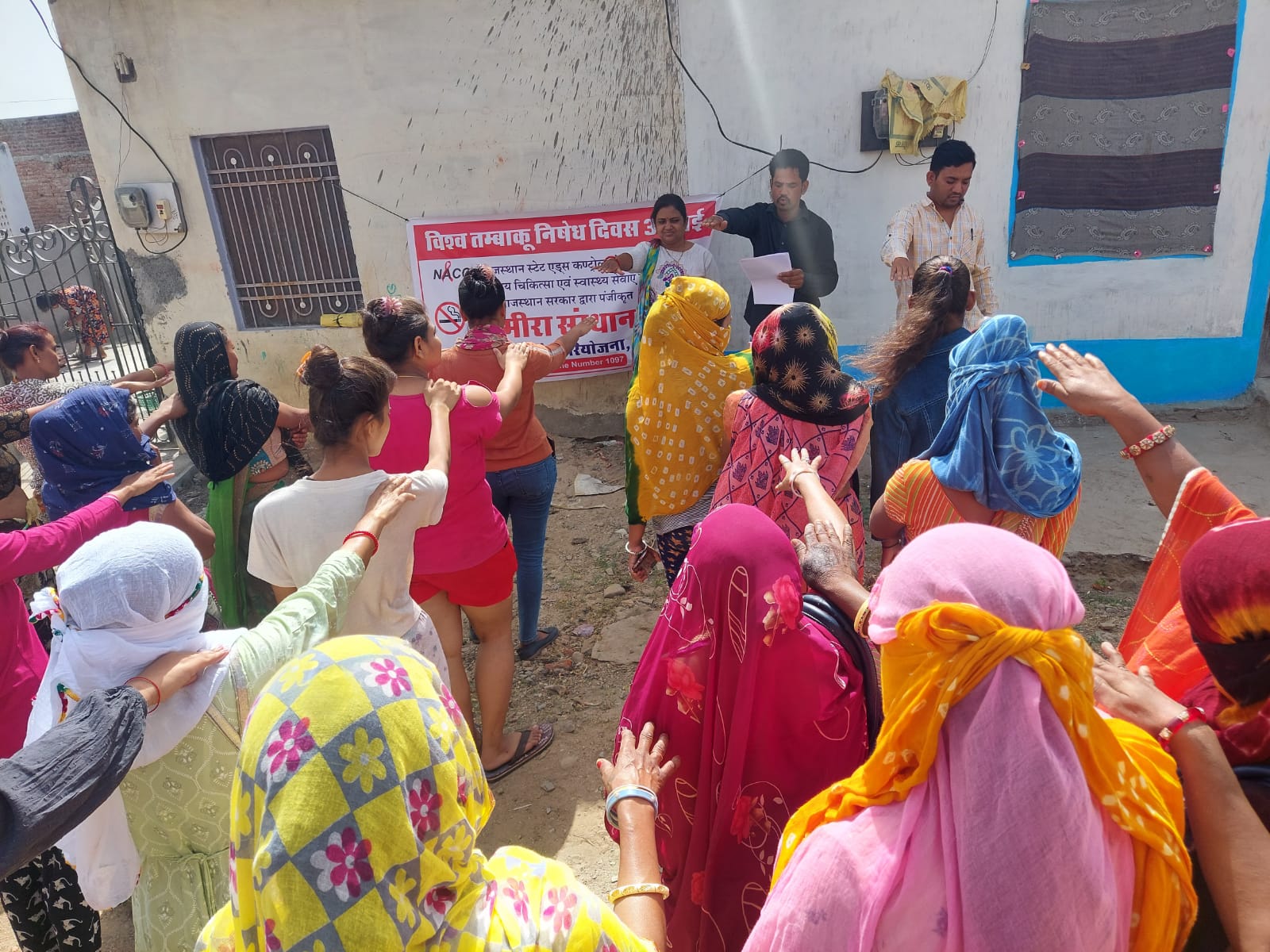 Women taking part in a group discussion outside the centre