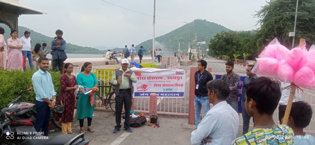 A programme team sharing health information in a public place